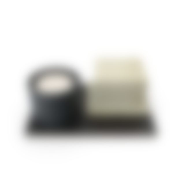 Candle and Small Box on Notebook